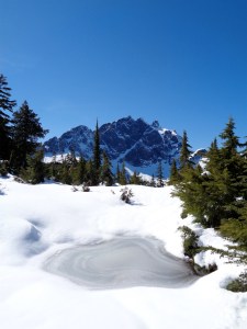 Three Fingers over a melting tarn