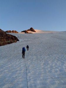 Hugging the rocks to the left